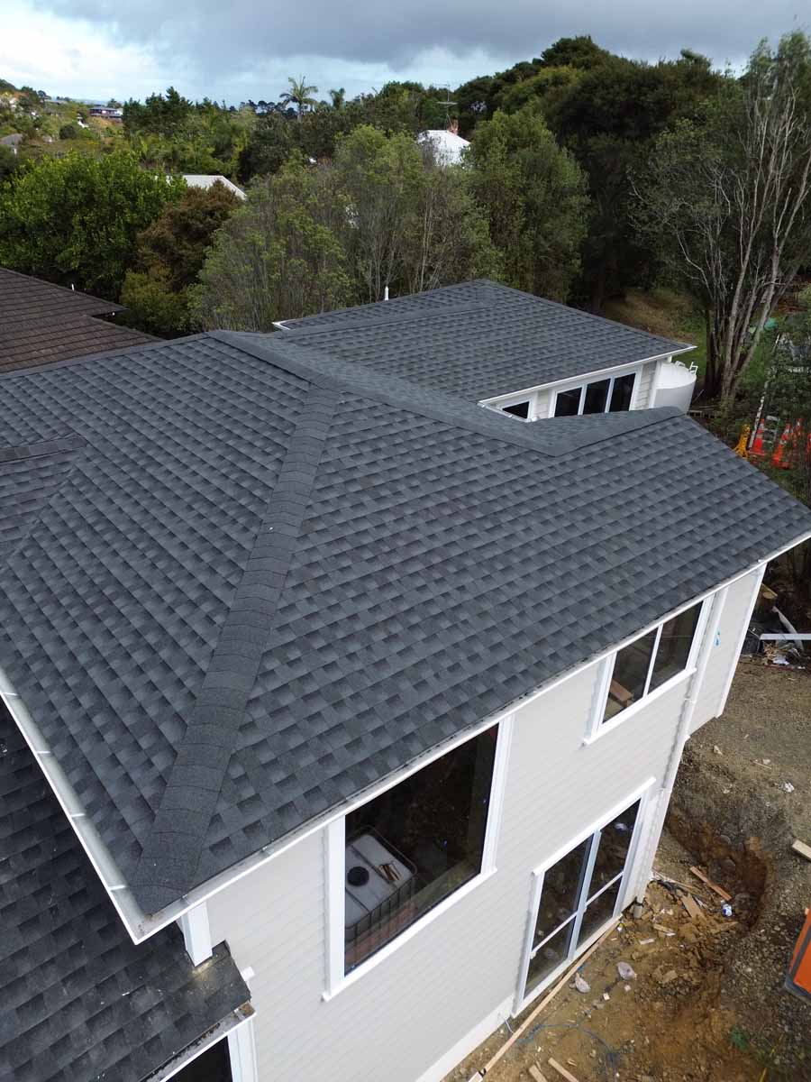 Deck Builders North Shore reviewing site plans on a Takapuna property