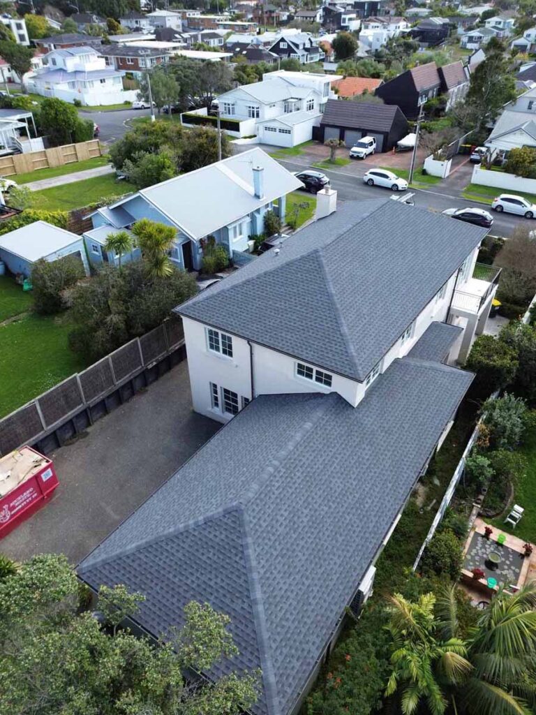 Deck Builders North Shore reviewing site plans on a Takapuna property