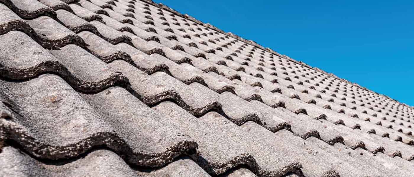 Charcoal asphalt shingle roof on an Auckland home after a concrete tile to shingle conversion